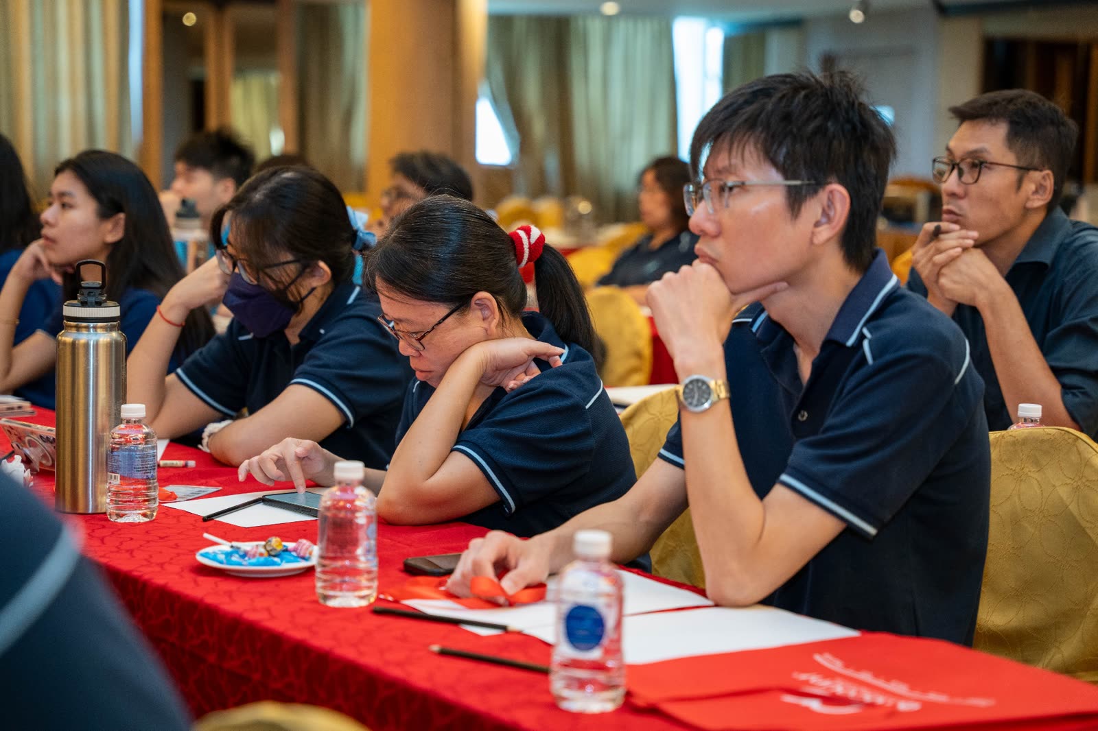 Team members engaged during training session