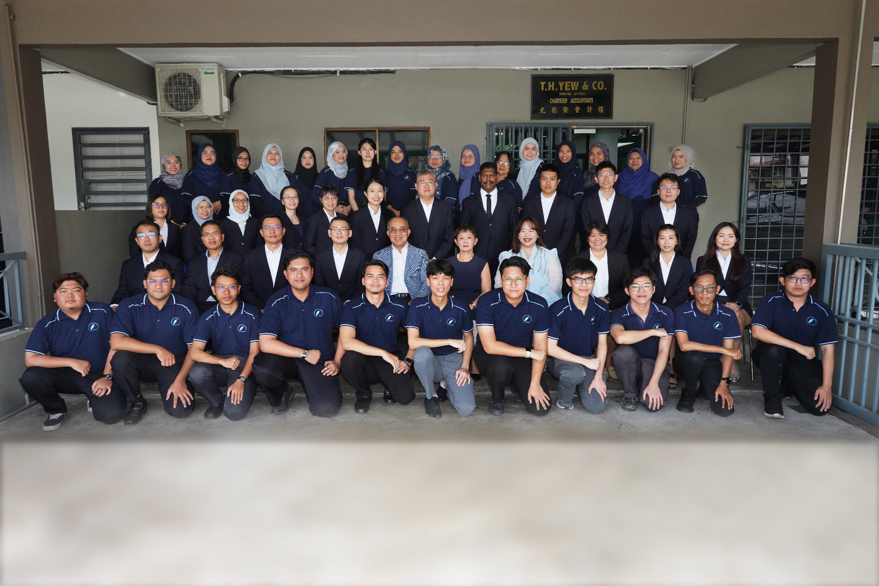 T.H. Yew & Co. team group photo outside the Ipoh office