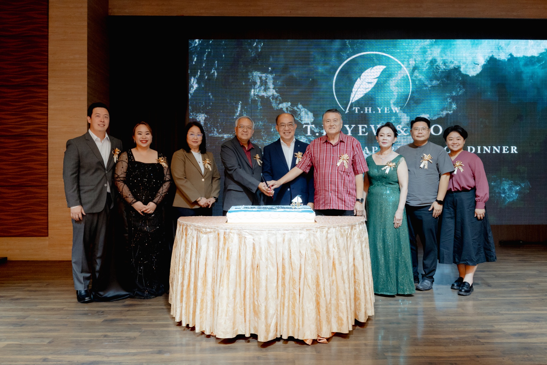 Cake-cutting ceremony celebrating 30 years of the firm