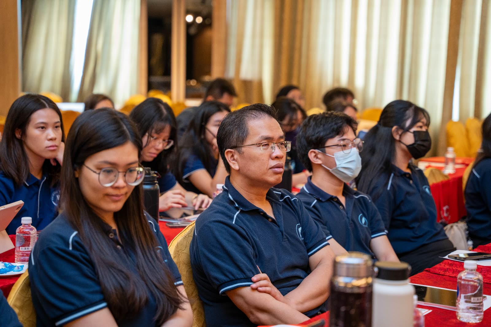 THYEW & Co. staff attending seminar session